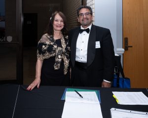 Kathie Ruiz and Jorge Ruiz greeting guests